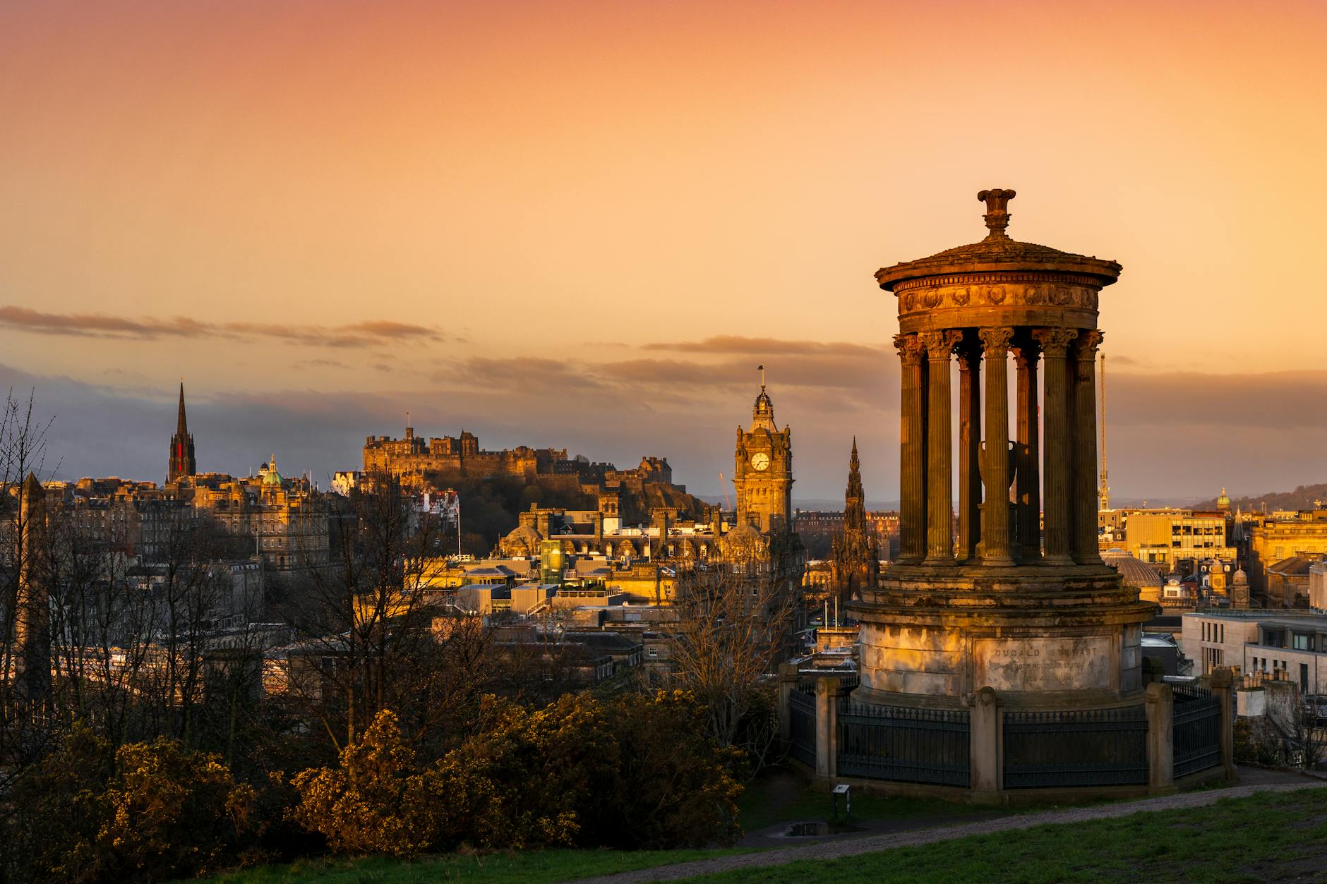Sunset view from Calton Hill Edinburgh overlooking the city skyline