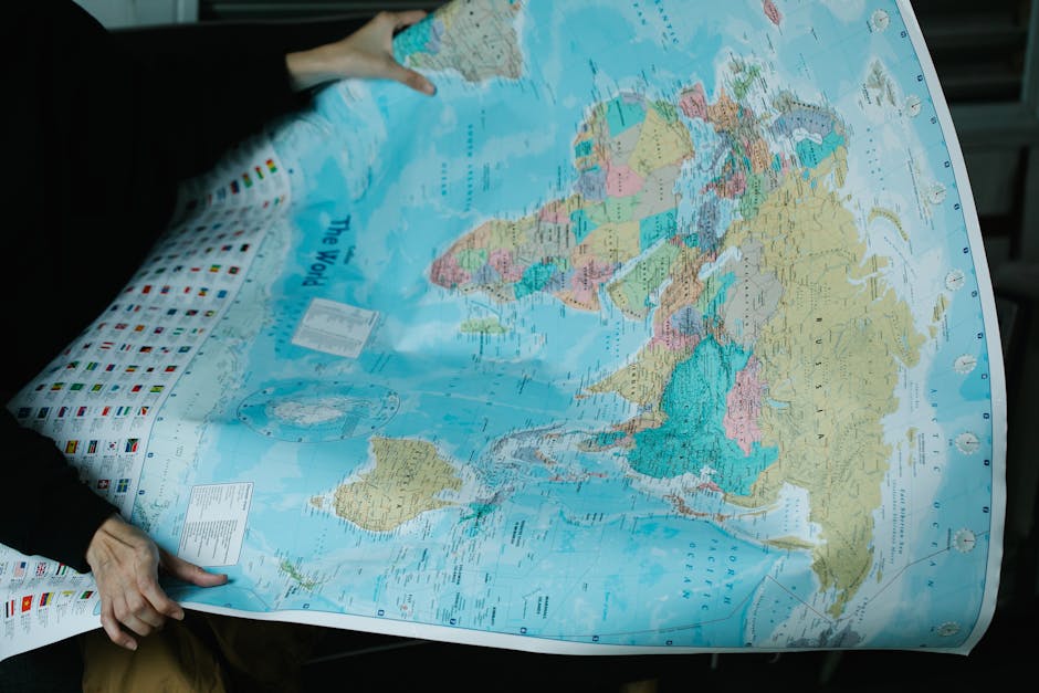 Backpacker with map exploring cheap Edinburgh accommodation
