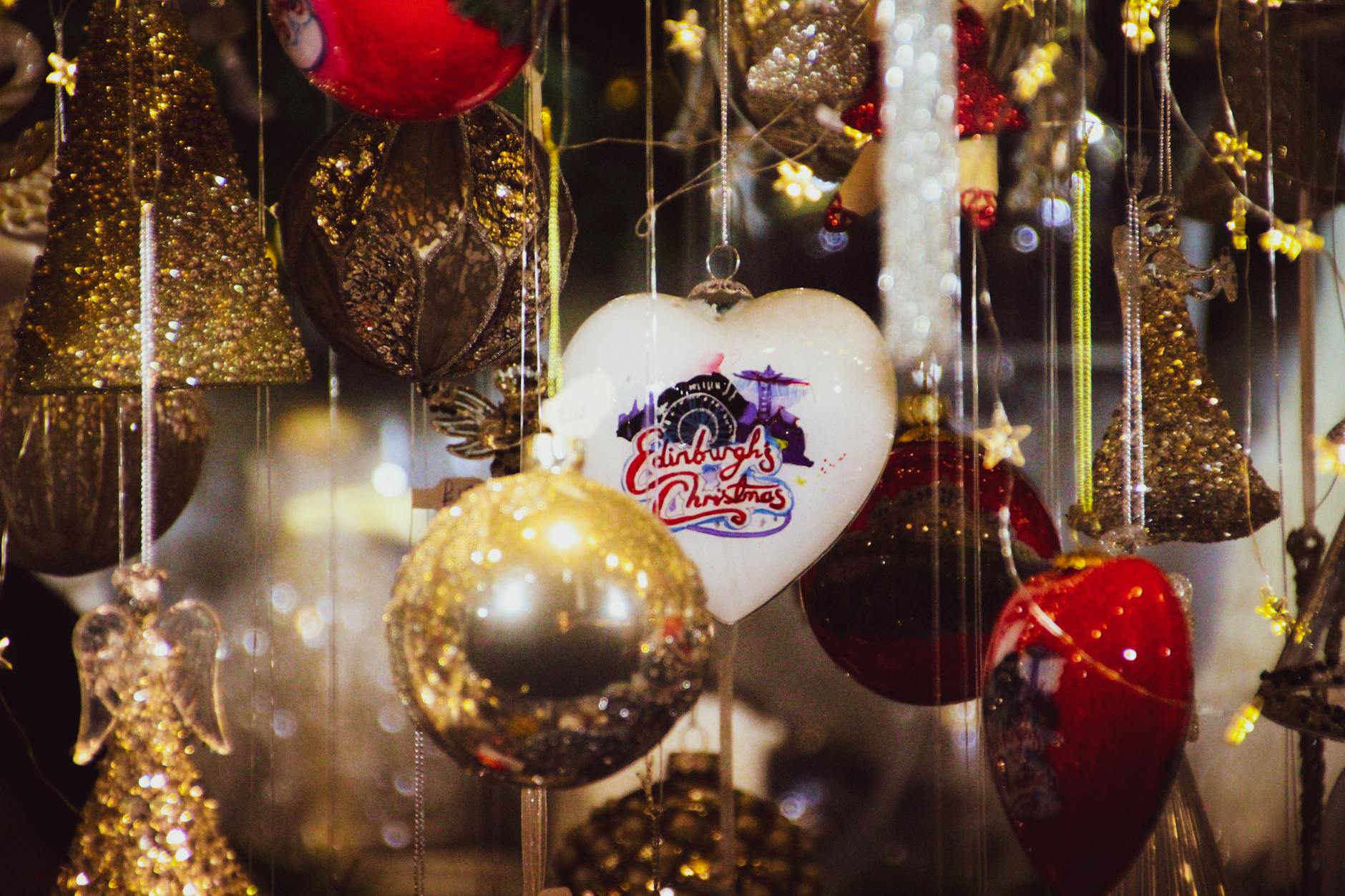 Edinburgh Christmas market in winter with festive lights and market stalls