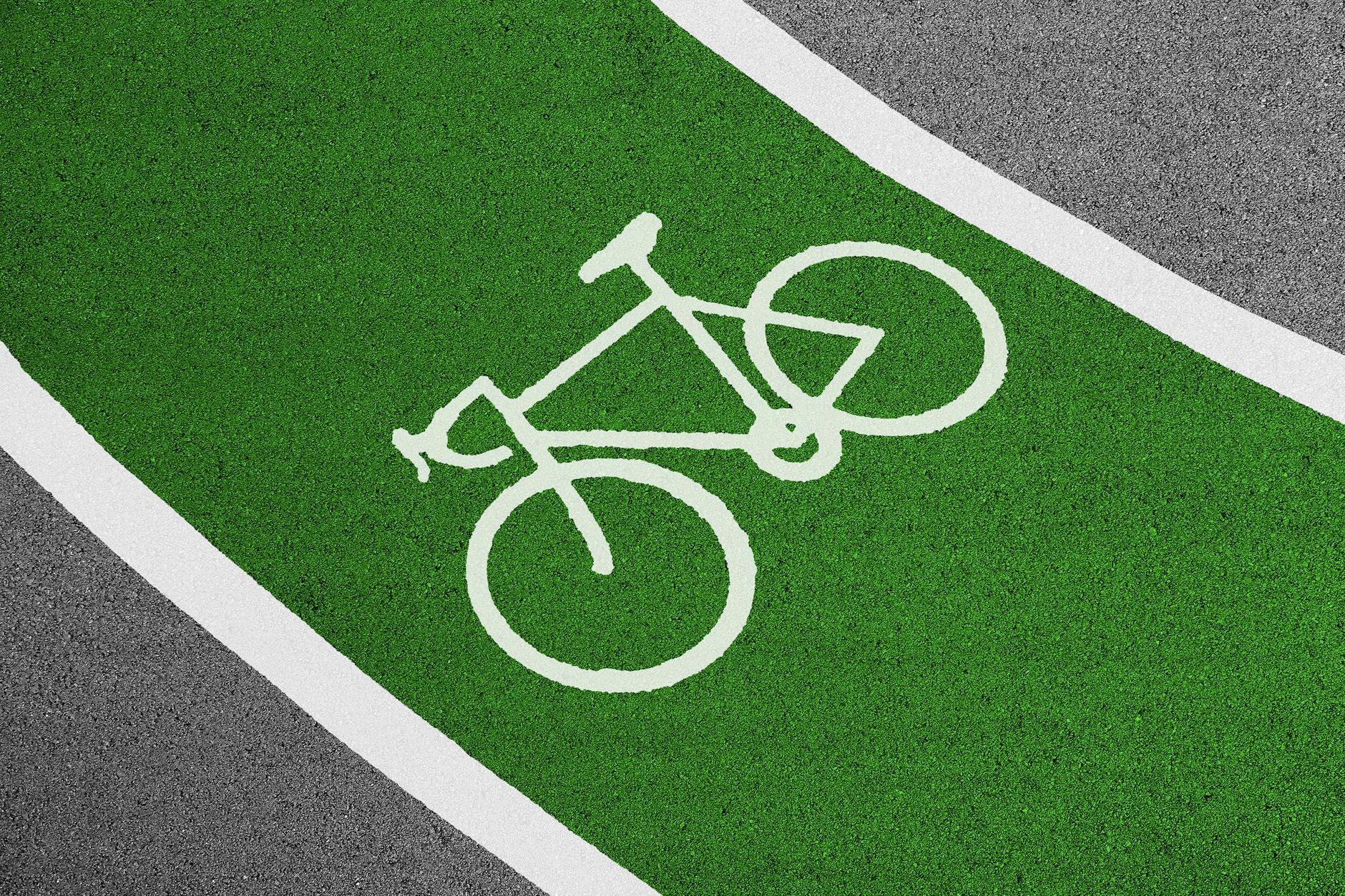 Cyclist on a dedicated cycle path along the Water of Leith walkway in Edinburgh