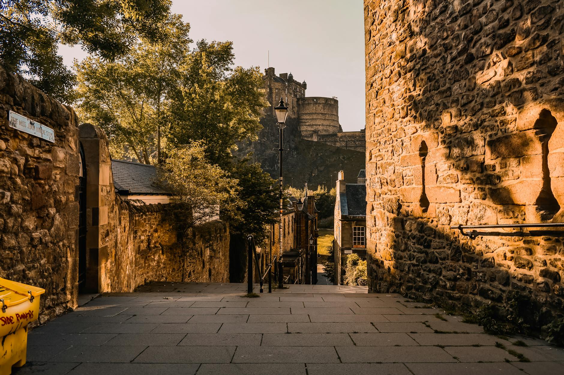 A narrow close in Edinburgh's Old Town — the hidden alleyways that branch from the Royal Mile revealing the medieval city's secret heart