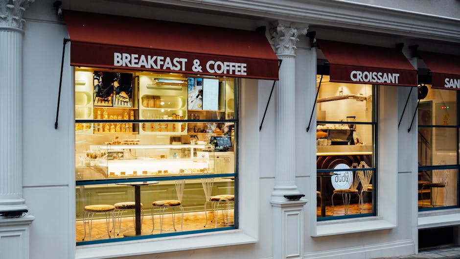 Cosy Edinburgh Royal Mile coffee shop with inviting window display