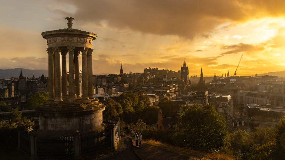 Edinburgh skyline sunset from Calton Hill Dugald Stewart Monument