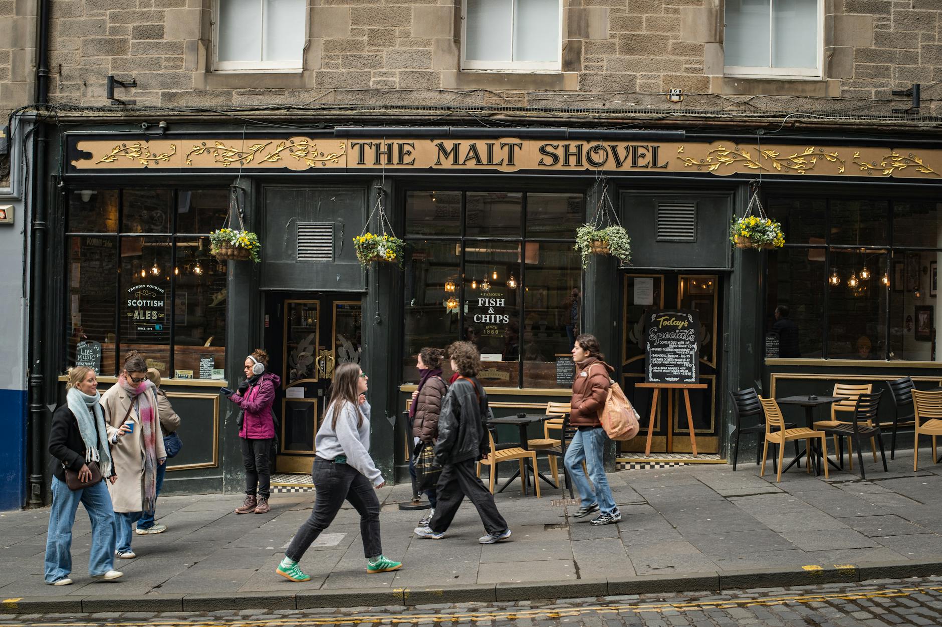 Traditional Edinburgh pub interior, part of the cultural experience on your first time in Edinburgh