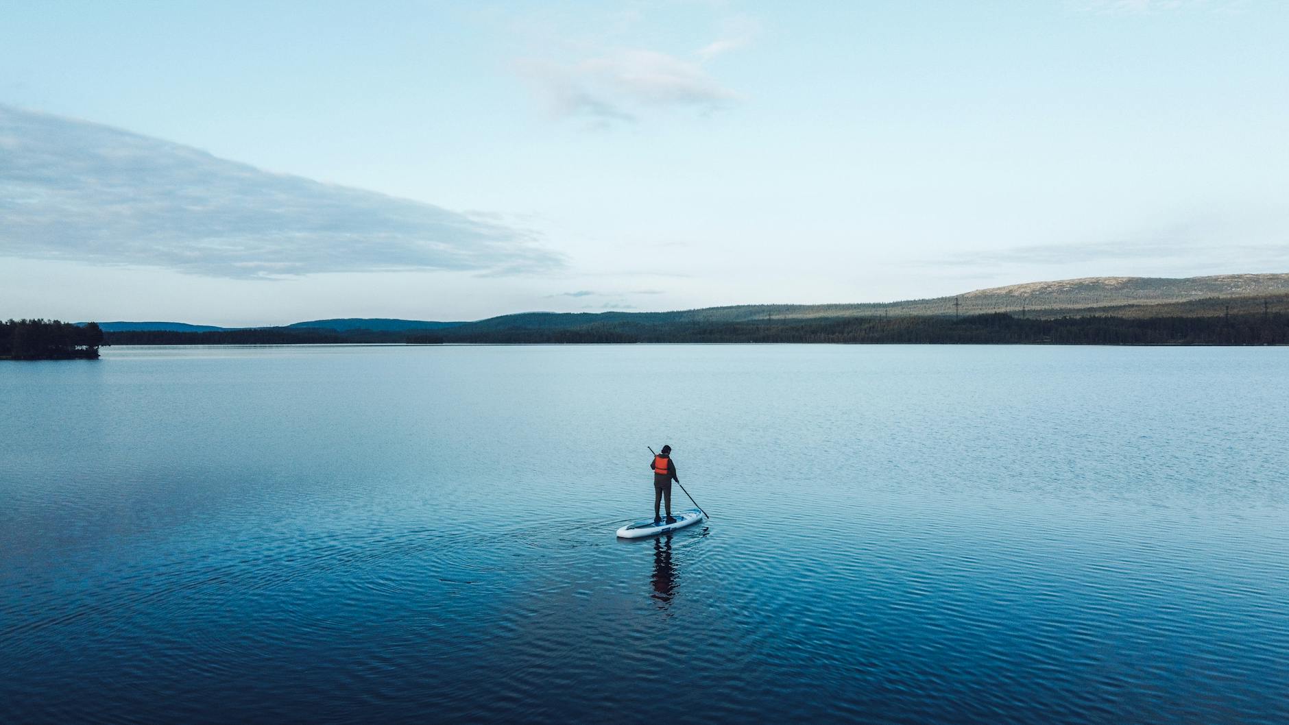 Stand-up paddleboarding on calm waters near Edinburgh outdoor activities Edinburgh