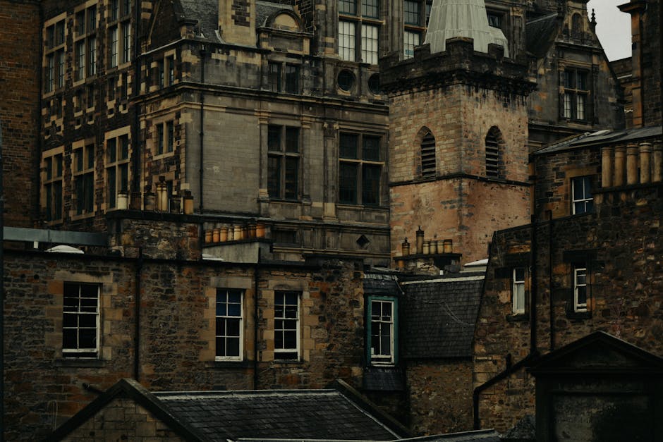 Dark stone buildings on an Edinburgh street