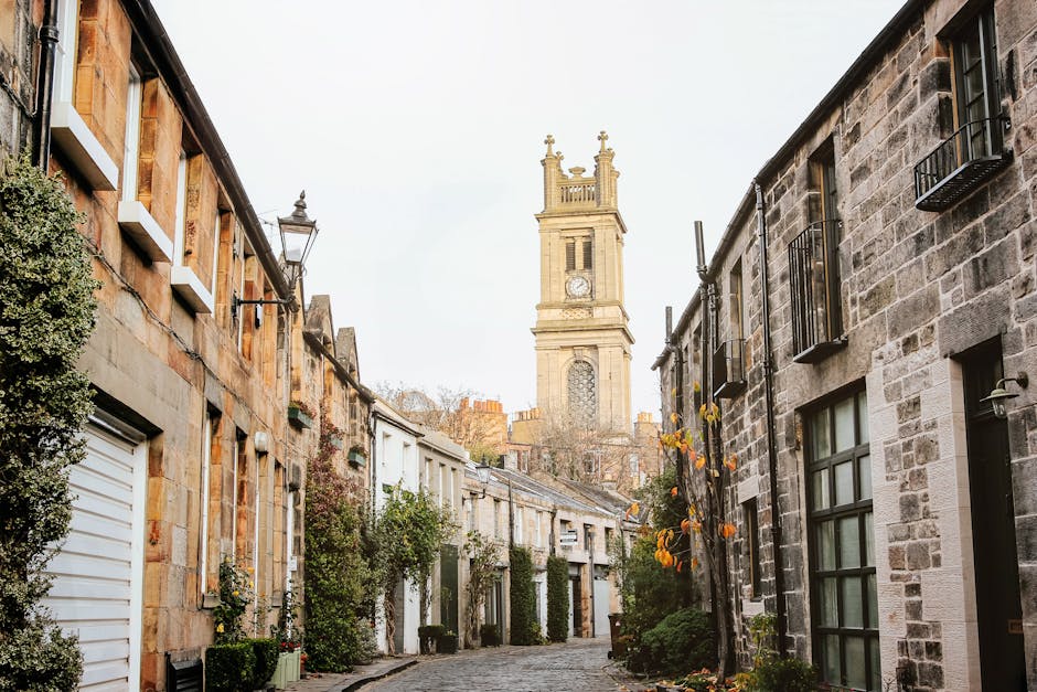 Cobbled street lined with stone buildings in Stockbridge, Edinburgh