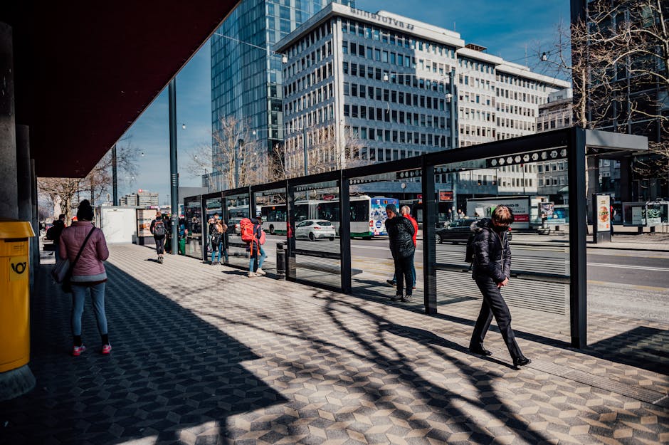 Edinburgh city bus stop with passengers