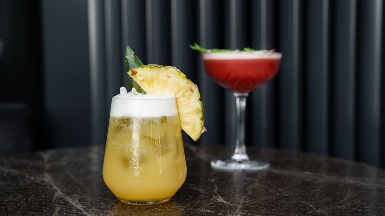 Cocktails served on a bar counter in an Edinburgh cocktail bar