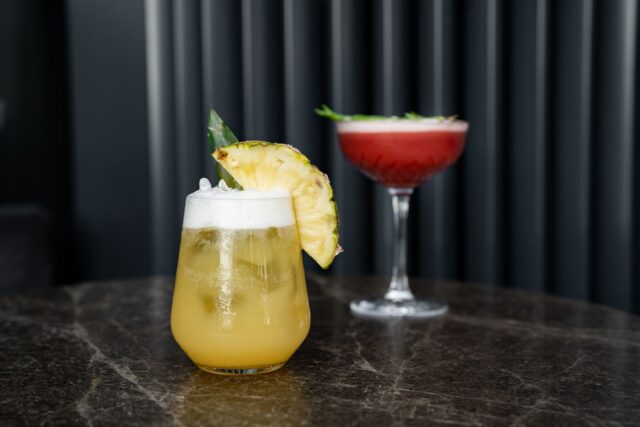 Cocktails served on a bar counter in an Edinburgh cocktail bar