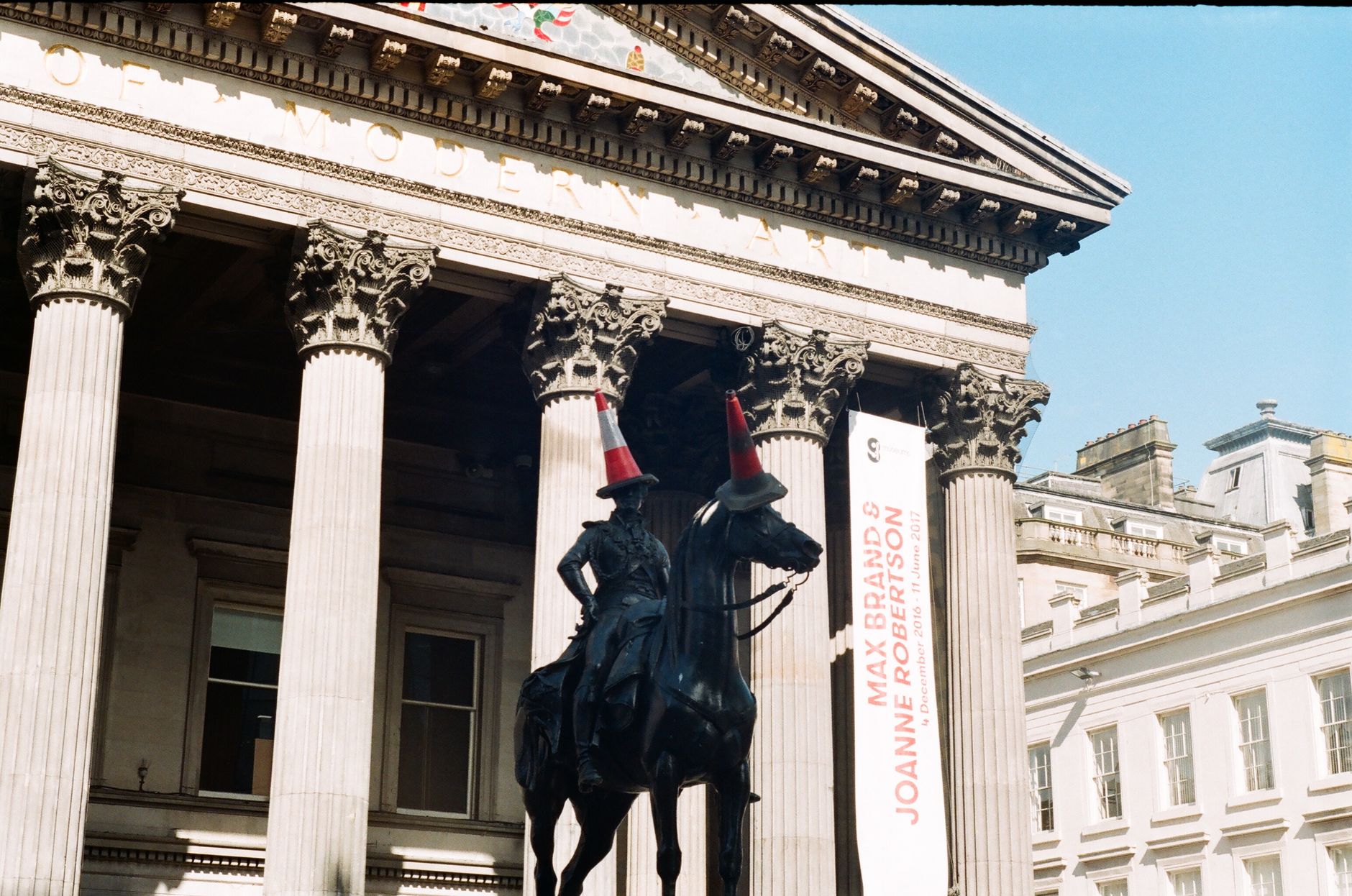 The Duke of Wellington statue wearing traffic cones outside Glasgow's Gallery of Modern Art