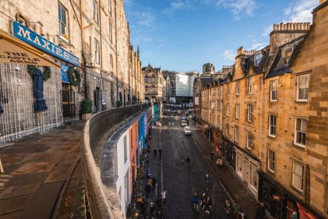 Colourful shopfronts along Victoria Street in Edinburgh Old Town